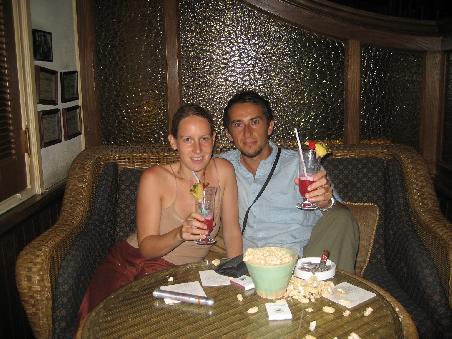 having a singapore sling at raffle's bar