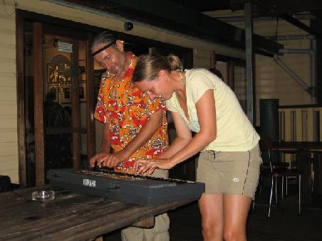 me trying to play piano with one of Nimbin Hippies (thank you Uschi for teaching me the Flea waltz when i was 7yrs old!)