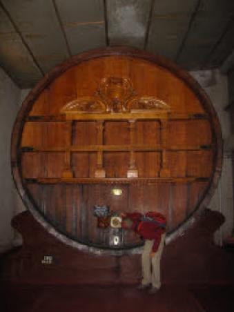 big barrel (90.000 liters capacity) and marc having a sip