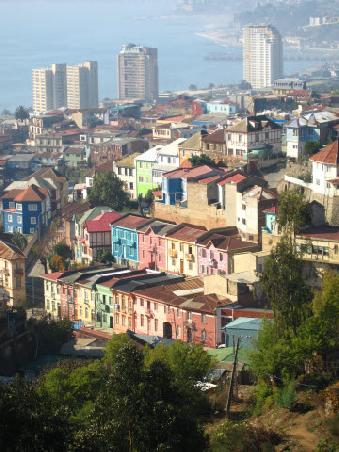contrast of new skyscrapers and old colourful apartments