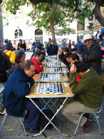 concentrated chileneans playing chess