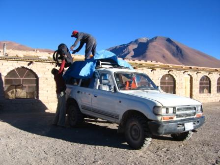 getting ready every morning - packing our stuff on the roof of the car