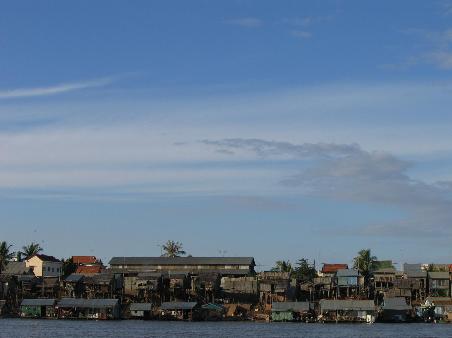 Lots of small wooden houses crowd along the river for most of the trip.