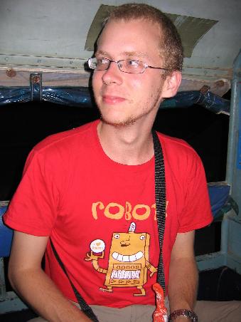 Look how happy i am to be taking the magical tuk-tuk. And note the robot shirt - it's a traditional thai design dating back 300 years.